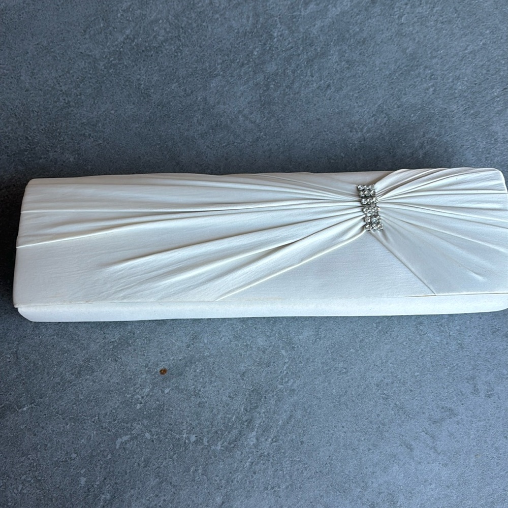 Jessica McClintock Satin Clutch Creamy Satin with rhinestone detail.